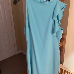 Adorable aqua sheath dress from Black Halo. Hits just above knee -flirty details